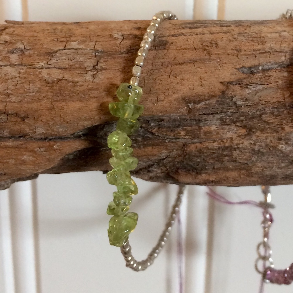 Real Peridot and silver plated bracelet.